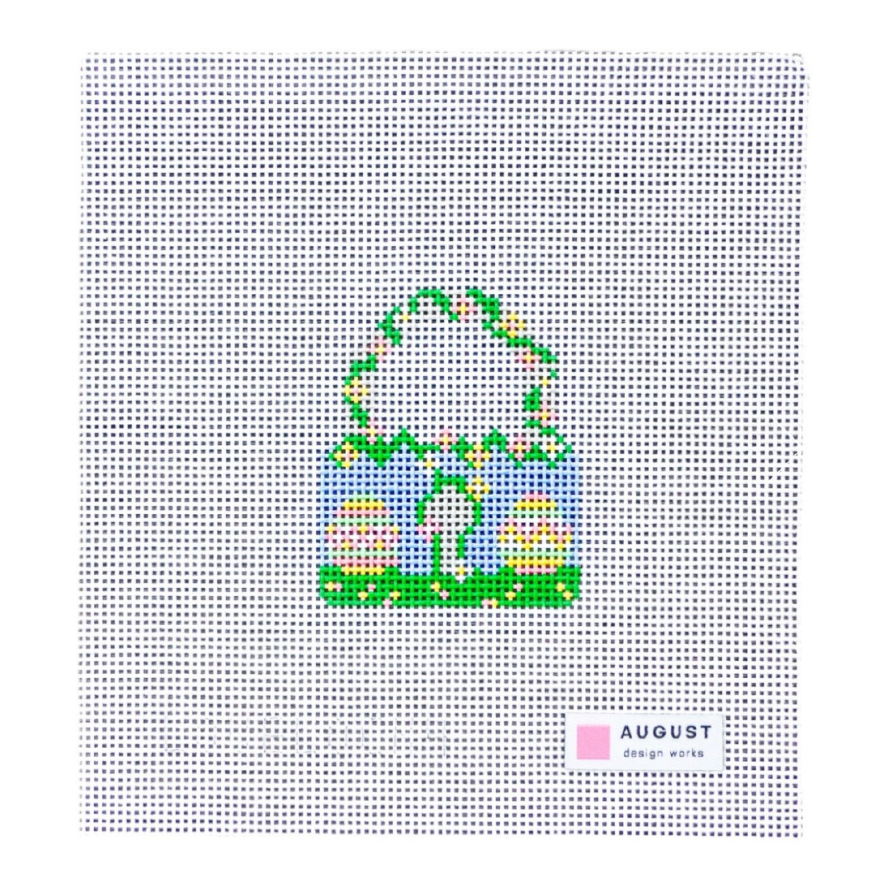 Cross-stitched pattern of a Easter basket with eggs on a white background